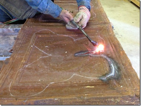 Cutting torch used to cut tin